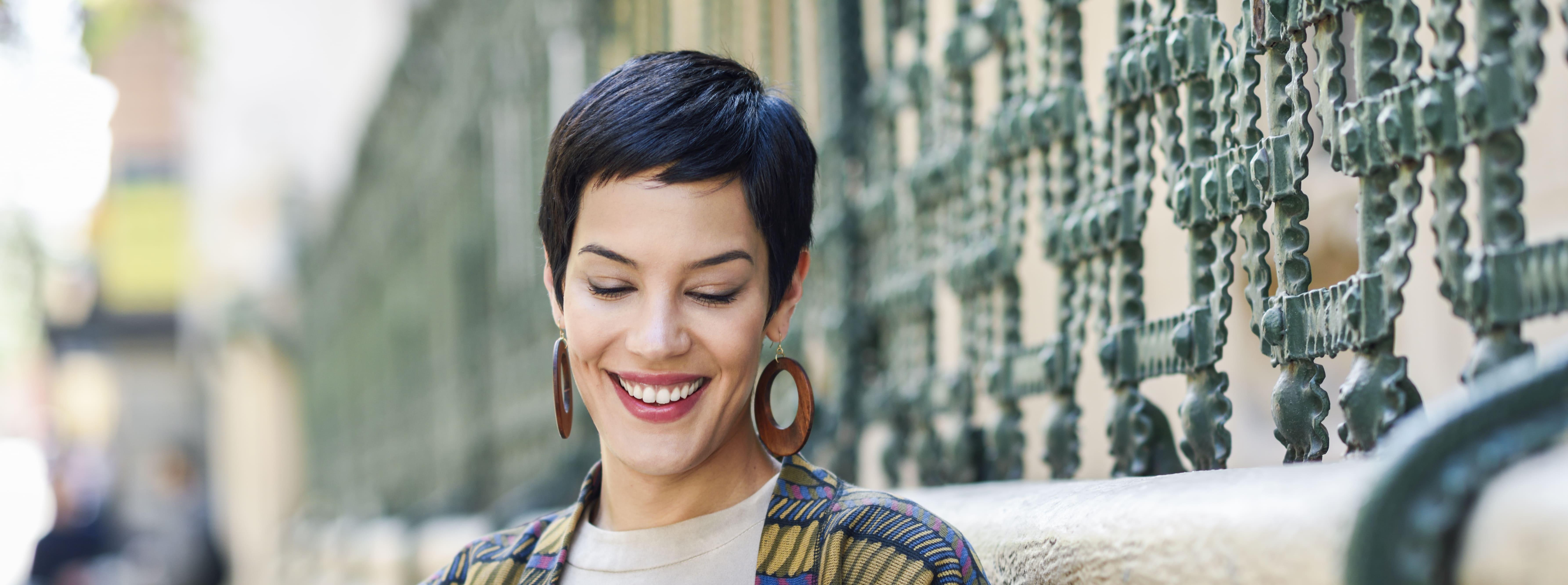 smiling-fashionable-young-woman-using-tablet-outdo-2026-01-05-00-41-11-utc.jpg